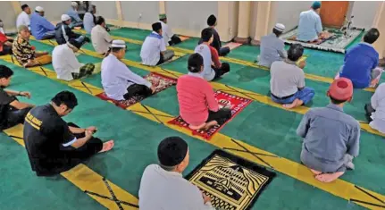  ?? Photo: Reuters ?? Muslims pray while practicing social distancing inside a mosque in Temanggung, Central Java province, Indonesia, on April 3, 2020.