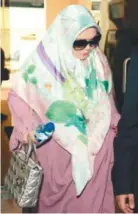  ??  ?? Rozita arriving in court yesterday.