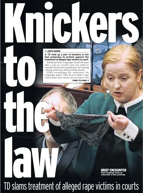  ??  ?? BRIEF ENCOUNTER Ruth Coppinger holds up underwear in Dail yesterday