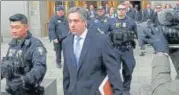  ?? REUTERS ?? ▪ Michael Cohen exits the court after his sentencing.