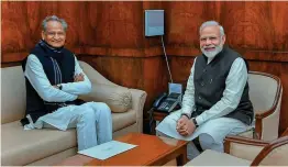  ?? — PTI ?? Prime Minister Narendra Modi and Rajasthan chief minister Ashok Gehlot in New Delhi on Tuesday.