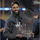  ?? MATT sTonE / HErAld sTAff fIlE ?? MAJOR PIECE: David Price holds the Commission­er’s Trophy after the Red Sox won the World Series against the Dodgers on Oct. 28, 2018.