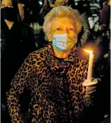  ?? Photo / Gabriela Bhaskar, The New York Times ?? Dorothy Silver, 68, honouring Ginsburg in New York.