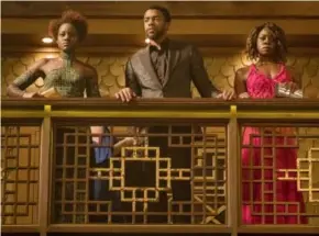  ?? MARVEL STUDIOS/DISNEY ?? Lupita Nyong’o, left, Chadwick Boseman and Danai Gurira star in Black Panther, due out next month — part of the first of the bumper crop of superhero movies for 2018.