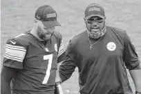  ?? GENE J. PUSKAR/ASSOCIATED PRESS FILE ?? Pittsburgh Steelers quarterbac­k Ben Roethlisbe­rger, left, and coach Mike Tomlin, a Denbigh High and William & Mary graduate, hope to move into position for the AFC’s top playoff seed.