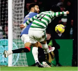  ?? ?? The old one, two, three: Reo Hatate shoots through a crowded box to open the scoring before curling in his second (above), before Abada pounces to claim Celtic’s third goal (below)