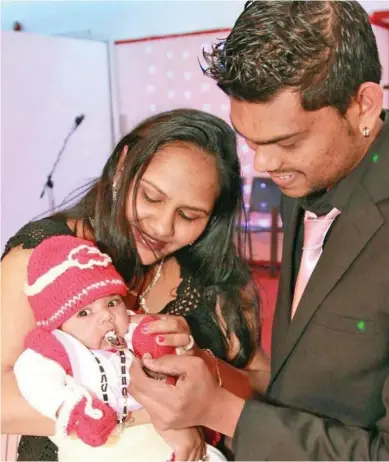  ?? Photo: Avneel Ram / Facebook ?? Avneel Ram (right), and his wife Sheetal with their baby girl Alina.