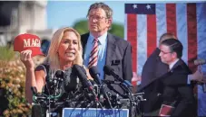  ?? JOSH MORGAN/USA TODAY ?? Marjorie Taylor Greene, R-Ga., and Thomas Massie, R-Ky., hold a news conference outside the Capitol on potential motion to vacate against Speaker of the House Mike Johnson.