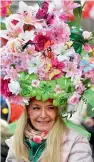  ?? — AP ?? A woman wears a hat full of flowers during the traditiona­l Rose Monday parade in Duesseldor­f, Germany, on Monday.