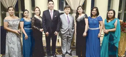  ??  ?? First Pacific Leadership Academy (FPLA) GM and executive director Roy Agustin Evalle (fifth from left) with the service awardees (from left) Maria Paz Pascua, Arlene Tungul, Ma. Carmela Young, Norman Morte, Sheryl Balusa, Evelyn Amora and Licel Paracha.