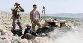  ?? Ansa ?? La lunga guerra Truppe Usa in Afghanista­n: sono 14.300 gli effettivi schierati contro talebani e Isis