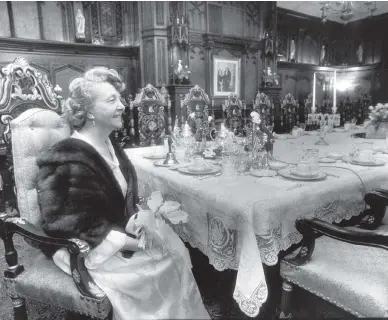  ?? MICHAEL MERCANTI / THE PHILADELPH­IA INQUIRER VIA AP FILES ?? In this 1988 photo, Sweet Angel Divine sits in her Woodmont estate in Gladwyne, Pa. Born Edna Rose Ritchings, the widow of Father Divine and leader for decades of a religious movement he founded has died in Pennsylvan­ia.
