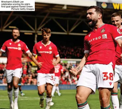  ?? ?? Wrexham’s Elliott Lee celebrates scoring his side’s first goal against Forest Green
Picture: Getty Images