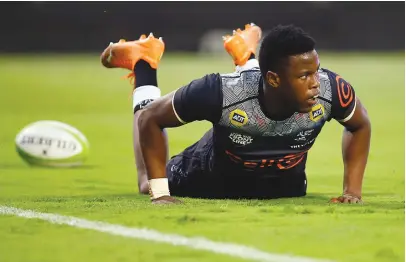  ?? Picture: Gallo Images ?? ALL THE WAY. Sharks fullback Aphelele Fassi scores a try during their Preparatio­n Series match against Griquas at Kings Park in Durban ion Sunday.