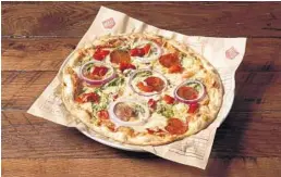  ?? BBX CAPITAL AND MOD PIZZA FLORIDA/COURTESY ?? The new MOD Pizza in Parkland offers seasonal pizza, such as the Kane with mozzarella, pepperoni, spinach, red onion and gorgonzola.