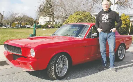  ?? BRAD HODSON ?? It took Dennis Hilton many years to put his 1965 Mustang together the way he'd envisioned, and he says he is pleased with the final results.