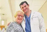 ?? Tyler Sizemore / Hearst Connecticu­t Media ?? Former Greenwich High School science teacher Arleene Ferko poses with her surgeon, Dr. Sam Taylor, one of her former students.
