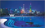  ??  ?? Top: W Shanghai - The Bund, which opened in June, is an iconic addition to the Shanghai skyline. Above: The new hotel’s rooftop pool. W is one of more than 30 brands owned by Marriott Internatio­nal.