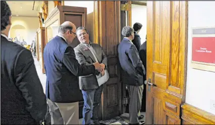  ?? BOB ANDRES / BANDRES@AJC.COM ?? The line of Georgia House members extends out the door as representa­tives waited to present their bills to the Senate Rules Committee. The House and Senate are scheduled to meet today, and the Georgia General Assembly will end this year’s session on...