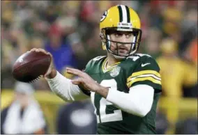  ?? MATT LUDTKE - THE ASSOCIATED PRESS ?? FILE - In this Oct. 15, 2018, file photo, Green Bay Packers quarterbac­k Aaron Rodgers (12) throws a pass during the first half of an NFL football game against the San Francisco 49ers in Green Bay, Wis. Jared Goff grew up in Northern California watching Rodgers’ exploits at Cal. Goff finally faces Rodgers on the field for the first time when the unbeaten Los Angeles Rams host the Packers.