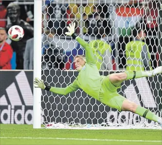  ?? DAN MULLAN
GETTY IMAGES ?? Jordan Pickford of England saves the fifth penalty from Carlos Bacca of Colombia in the shootout at Spartak Stadium in Moscow, Russia, on Tuesday. Pickford was a hero in England’s 4-3 victory.