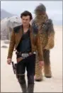  ?? JONATHAN OLLEY — LUCASFILM VIA AP ?? This image released by Lucasfilm shows Alden Ehrenreich and Joonas Suotamo in a scene from “Solo: A Star Wars Story.”