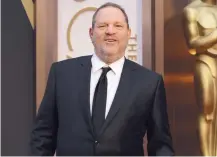  ?? JORDAN STRAUSS/INVISION/AP ?? In March 2014, Harvey Weinstein arrives at the Oscars at the Dolby Theatre in Los Angeles. He has been accused of of misdeeds including sexual harassment and rape by more than 80 women.