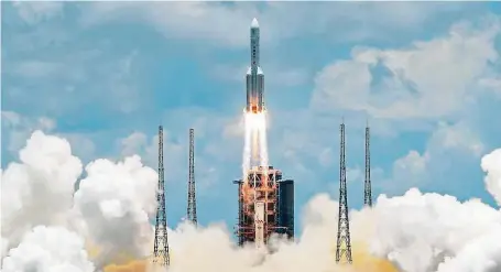  ?? PHOTO REUTERS ?? The Long March 5 Y-4 rocket takes off from Wenchang Space Launch Center in Wenchang, Hainan Province, China, July 2020.