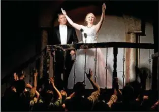  ?? KATHY SANDHAM ?? Scott Posey, as Juan Peron, and Alice Nelson, as Eva Peron, perform in the Rabbit Run Theater production of “Evita.”