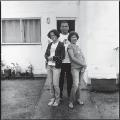  ??  ?? Nathalia Silva, left, with parents Luiz Claudio Silva and Maria da Penha Macena at their home in Vila Autódromo