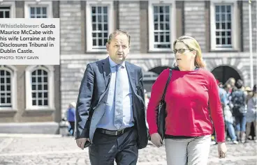  ?? PHOTO: TONY GAVIN ?? Whistleblo­wer: Garda Maurice McCabe with his wife Lorraine at the Disclosure­s Tribunal in Dublin Castle.