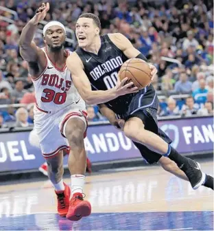  ?? JOHN RAOUX/ASSOCIATED PRESS ?? While forward Aaron Gordon had drawn interest from multiple teams, the Magic agreed on Sunday with their 2014 dynamic first-round pick on a four-year deal for $84 million.