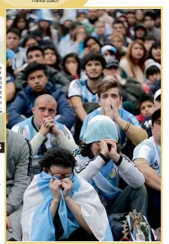  ?? AP ?? Argentine fans react in disbelief at the end of the televised match between France and Argentina in Buenos Aires on Saturday. —