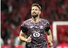  ?? ?? Lille's French forward Olivier Giroud, 39, will stay another season with the Ligue 1 club