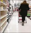  ?? SETH WENIG / AP ?? Shelves for hand sanitizer and hand soap are mostly empty recently at a Target in New Jersey. Experts urge shoppers not to hoard such items.