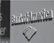  ?? Jeenah Moon / Bloomberg file ?? Bank of America is keeping its optimistic economic outlook despite reporting lower profits for the first three months of the year.