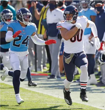  ?? WADE PAYNE/AP ?? Bears tight end Jimmy Graham gets loose down the sideline this month against the Titans. Graham has five touchdown receptions this season, but he is averaging just 8.6 yards per catch and doesn’t have the speed he once did.