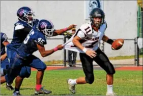  ?? SAM STEWART - DFM FILE ?? Boyertown’s Ayden Mathias (11) returns at QB for the Bears in 2018.