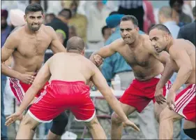  ?? ARLEN REDEKOP / PNG ?? Competitor­s square off during the kabaddi tournament outside the Bell Centre in Surrey last Sunday.