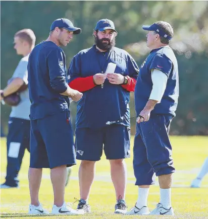  ?? STAFF PHOTO BY MATT WEST ?? DEFENSIVE BRAINTRUST: Patriots defensive line coach Brendan Daly, defensive coordinato­r Matt Patricia and head coach Bill Belichick hold a conference at Gillette Stadium