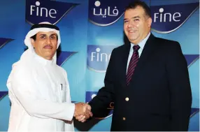  ??  ?? Hussein Al-Ghamdi, executive officer and chairman of the energy and manufactur­ing sector in the Saudi Quality Council Board, left and Ahmed Zain, head of sales and marketing at Fine Hygienic Holding.