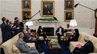  ?? GeTTy ImageS ?? INROADS: President Biden and Vice President Kamala Harris meet with members of Congress to discuss the infrastruc­ture bill.