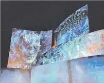  ?? Libby Hill Los Angeles Times ?? AN IMAGE is projected onto Walt Disney Concert Hall in downtown L.A. to celebrate a “Game of Thrones” season premiere.