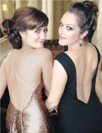  ??  ?? Designer Chloe Angus, right, put herself and actress Laura Adkin in backless gowns before a benign tumour paralyzed her but didn’t harm her business or designs to help fund Huntington’s disease research.