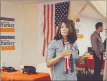  ?? ROZETTE RAGO / THE NEW YORK TIMES ?? Republican Diane Harkey views the scene Aug. 4 at the opening of her campaign office in San Juan Capistrano, Calif. The energy in the midterms is working against female Republican candidates who are reluctant or unable to claim any advantage to being a woman among voters.