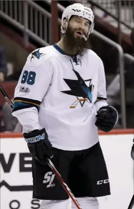  ?? ASSOCIATED PRESS FILE PHOTO ?? San Jose Sharks’ Brent Burns reacts after scoring against the Arizona Coyotes in Glendale, Ariz., recently. The talented defenceman has 27 goals this season.