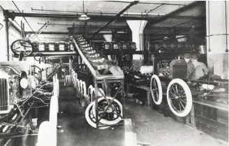  ?? Ford Motor Co. 1912 ?? Model T’s get wheels and brass radiators at the Ford Highland Park Plant in Michigan in 1912. The loss of the horse and buggy gave many the opportunit­y to learn to drive.