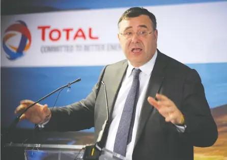  ?? ANDY BUCHANAN / AFP / GETTY IMAGES FILES ?? “Even if BP, Total and Shell divest from oil and gas it does not change anything,” said Total SE chief executive Patrick Pouyanné,
arguing that selling assets to other producers who may be less mindful of climate concerns does little to help.