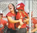  ?? Christian Abraham / Hearst Connecticu­t Media ?? Masuk celebrates during Class L softball action against North Haven.