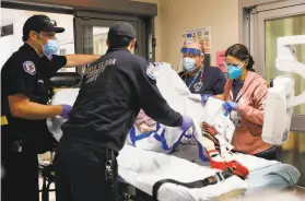  ?? Gabrielle Lurie / The Chronicle 2020 ?? Emergency room staff attend to a stroke patient at Regional Medical Center of San Jose in 2020. The potential rollback of some health rules has been stopped.